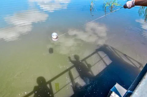 Take samples of water for laboratory testing. Stock Photos