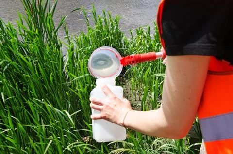 Take samples of water for laboratory testing. The concept - analysis of water Stock Photos
