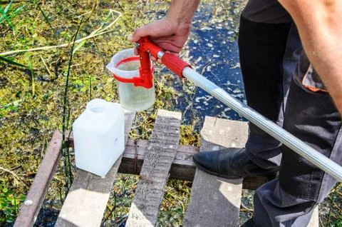 Take samples of water for laboratory testing. The concept - analysis of water Stock Photos