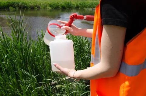 Take samples of water for laboratory testing. The concept - analysis of water Stock Photos