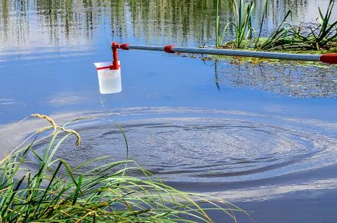 Take samples of water for laboratory testing. The concept - analysis of water Stock Photos