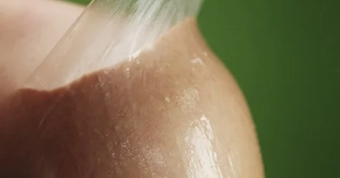 Take off a second skin closeup. after skin treatment, take off skin mask closeup Stock Footage 77440259