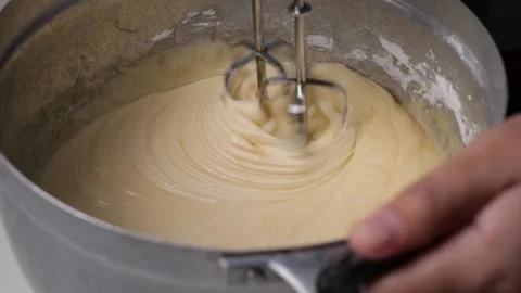 Take a slow motion shot Use a whisk to whisk the ingredients together so quic Video stock 188426912