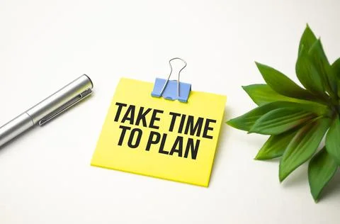 TAKE TIME TO PLAN text on sticker with pen on white background Stock Photos