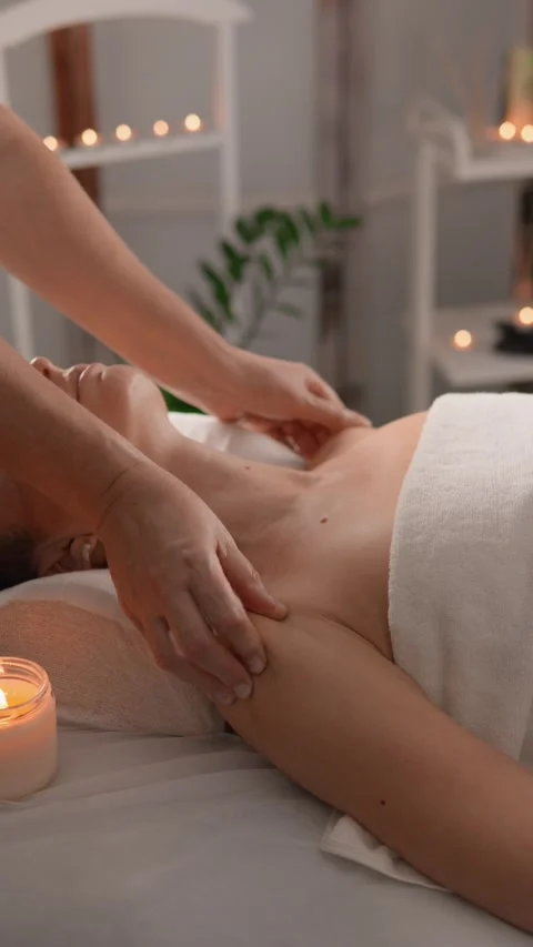 Take time to relax with a calming spa experience, enjoying a candlelit body Stock Footage 279218488