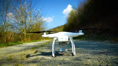 Take off from a UAV in o small forest path Stock Footage 144888811