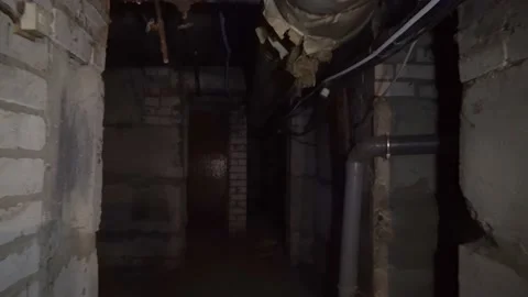 Take walk through an old dark underground basement or closet in an old house. Видео 156575490
