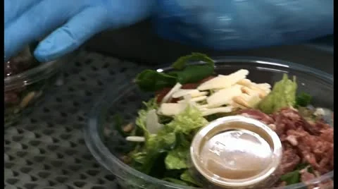 Takeaway salad on assembly line Stock Footage