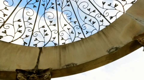 Taken from the bottom, a fast motion shot of the top part of a Monument Stock Footage 46853495