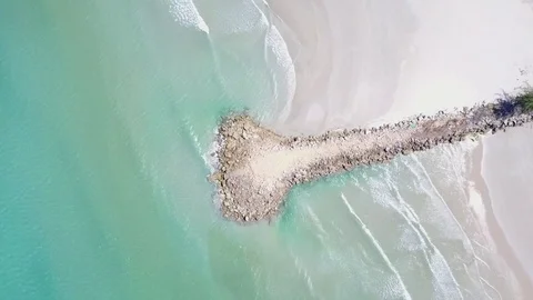 Takeoff above the pier, over a a reef and blue ocean Aerial view of beautiful 動画素材 74440312