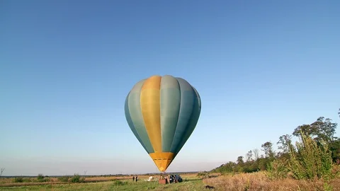 Takeoff air balloon at sunset time lapse Stock Footage 98889987