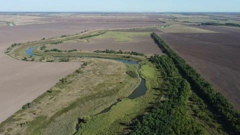 Takeoff and flight of a quadrocopter over the river. Stock Footage 160837090