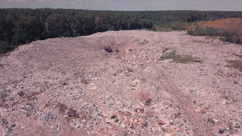 Takeoff over the garbage dump located in the forest, Ukraine, environmental Video stock 137515376