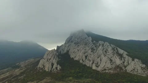 Takeoff over the ridge. the top of which is hidden by clouds. Autumn cloudy day Stock Footage 151151835