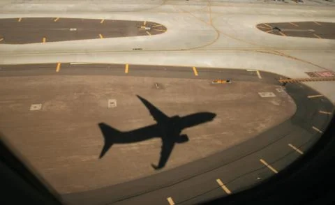 Takeoff shadow Stock Photos