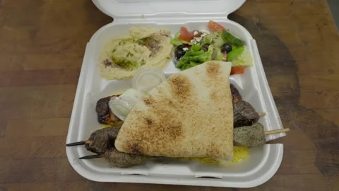 Takeout middle easter mix kabob plate Stock Footage 306886414