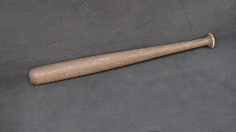 Takes a baton from the trunk of a car 스톡 동영상 135995924