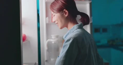 Takes cake from refrigerator Video stock 157137508