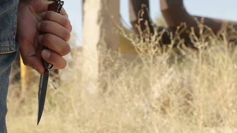 Takes a knife from pocket and opens it 3 - Slow Motion 스톡 동영상 135995976
