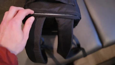 Takes laptop out of backpack Stock Footage 278812964