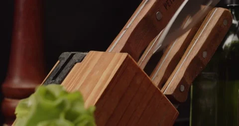 Takes out knife from set to use it, close-up Stock Footage 236321565