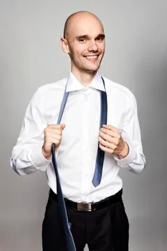 Takes off a Tie Stock Photos