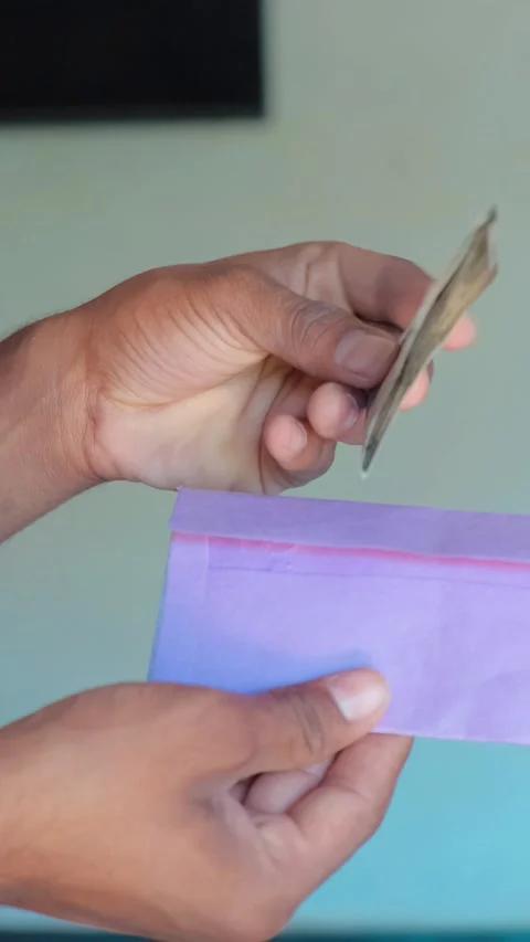 Taking 500 Rupee Note Out of Envelope Close Up Stock Footage 332654675
