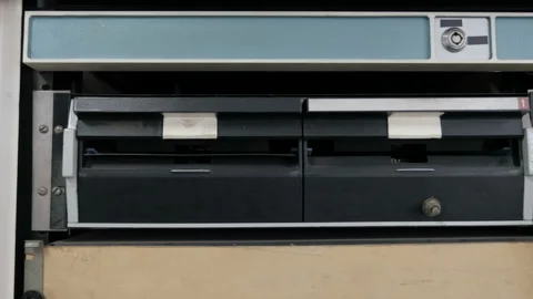 Taking 8 Inch Diskette From Floppy Drive, Close-Up Stock Footage 105466452