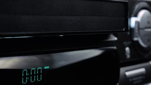 Taking and loading the tape in VHS video cassette recorder VCR 4k 動画素材 123456740