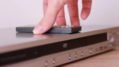 Taking and putting DVD remote control 動画素材 88245112