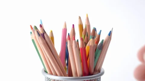 Taking and returning a handful of colouring pencils Stock Footage 115669201
