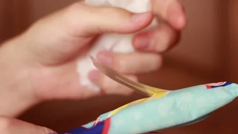 Taking antibacterial wipe closeup Stock Footage 79786227