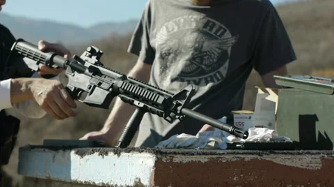 Taking apart a gun Video stock 32271932