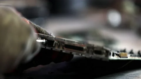 Taking apart obsolete computer parts to reuse or recycle - isolated close Video stock 149785461