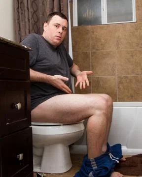 Taking a bathroom break Stock Photos