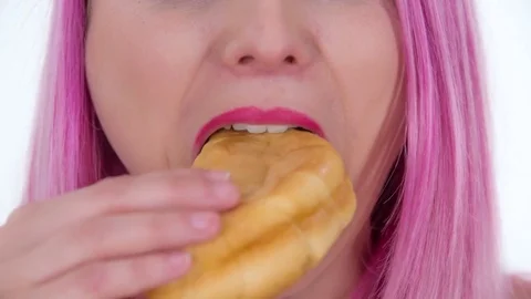 Taking a big bite bite of bread Stock Footage 83725357