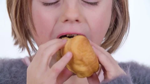 Taking a big bite of bread Video stock 83725653
