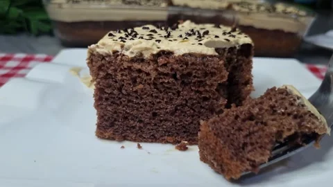 Taking a Bite of Moist Chocolate Coffee Cake with Fork - Close Up 4K Stock Footage 346820135