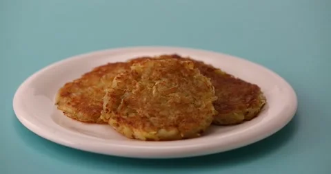 Taking a bite out of the hash browns 2 Stock Footage 132151997