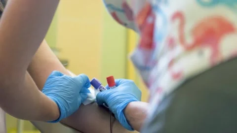 Taking blood for analysis from a vein Video stock 241433539