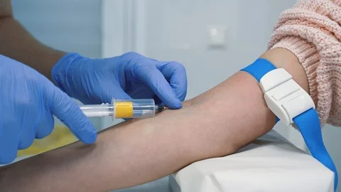 Taking blood for analysis from vein. Preparing hand, making injection Stock Footage 121624788