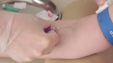 Taking blood from hand for analysis Stock Footage 75278819