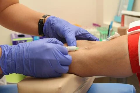 Taking blood in the laboratory for analysis Stock Photos