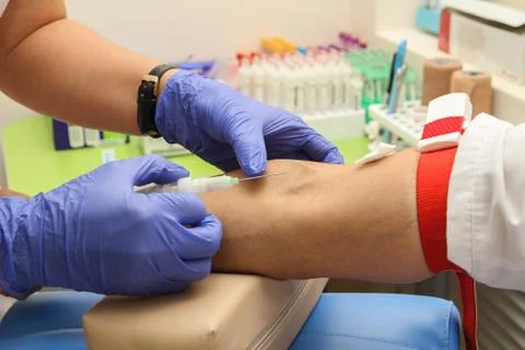 Taking blood in the laboratory for analysis Stock Photos