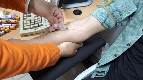Taking a Blood Sample Stock Footage 107081930