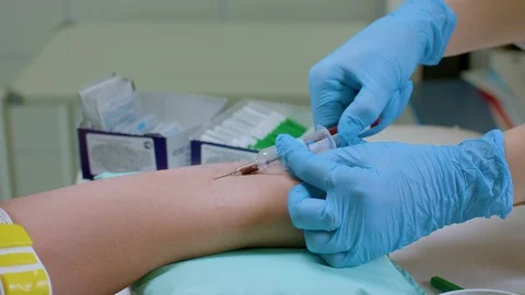 Taking blood from a vein in a lab Video stock 112217327