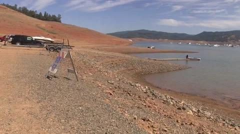 Taking the boat out in the drought ridden lake Video stock 51315218