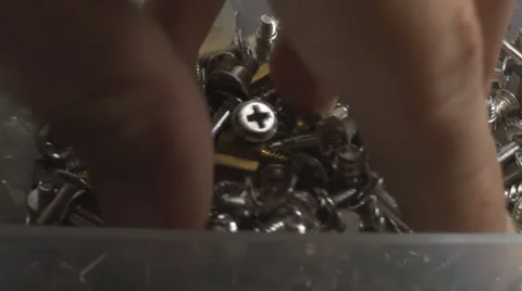 Taking Bolts Out Of The Box, Appliance, Nuts, Bolts, Extreme Close Up Stock Footage 37331002