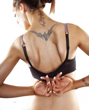 Taking off bra Foto stock