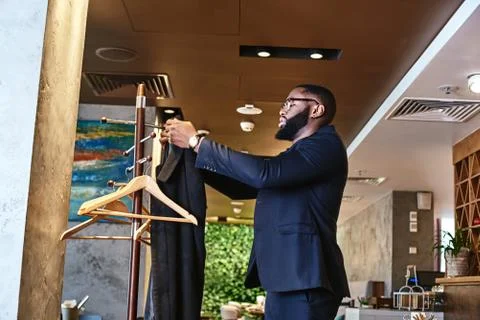 Taking a break can lead to breakthroughs. Businessman came into the restaurant Foto stock